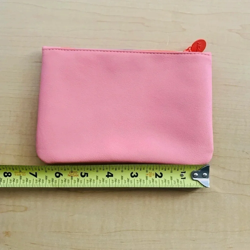 Like NEW IPSY comedic pouch